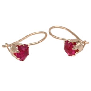 Gold hoop earrings with pink heart-cut gemstones set in prong bezels, displayed against a white background.