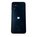 Back of a black Samsung smartphone with a triple camera module in the top-left corner and rounded edges.
