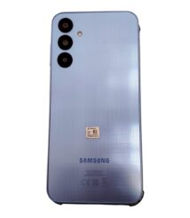 Blue Samsung smartphone back with a vertical triple-camera array in the top-left corner and a subtle dotted texture.