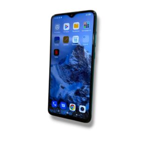 Angled smartphone showing a blue mountain wallpaper with app icons on the home screen.