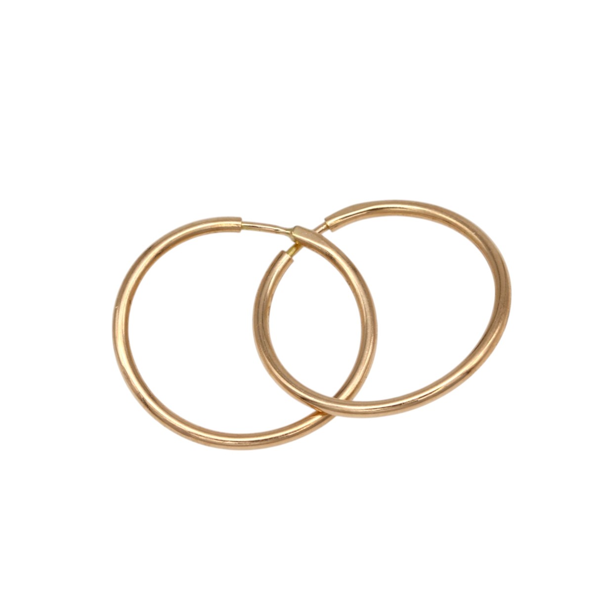 252f556ba953374d25da0548fe589bc7jpg - Mezola OÜ Two gold hoop earrings overlapping on a white background