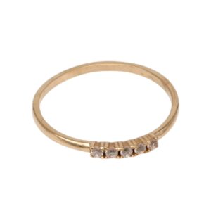 Gold band ring with five small diamonds set along the top edge, simple and elegant design.