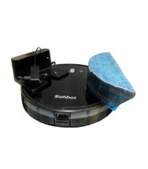 Round black robotic vacuum docked on its base with a blue mop pad attached on the side (brand: Schbot).