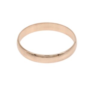 Rose gold band ring with a smooth, polished finish