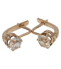 Gold-toned drop-style earrings with large clear faceted stones held in decorative lattice cages on hinged backs