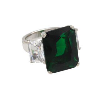Silver ring featuring a large emerald-cut deep green center stone with two clear side stones on a silver band