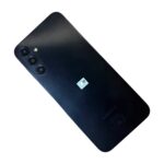 Back of a black Samsung smartphone showing a triple-camera module with a flash next to it.