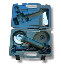 Green hard-shell tool case opened to reveal a corded angle grinder and accessories inside