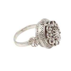 Silver filigree ring with a delicate floral centerpiece and openwork detailing.