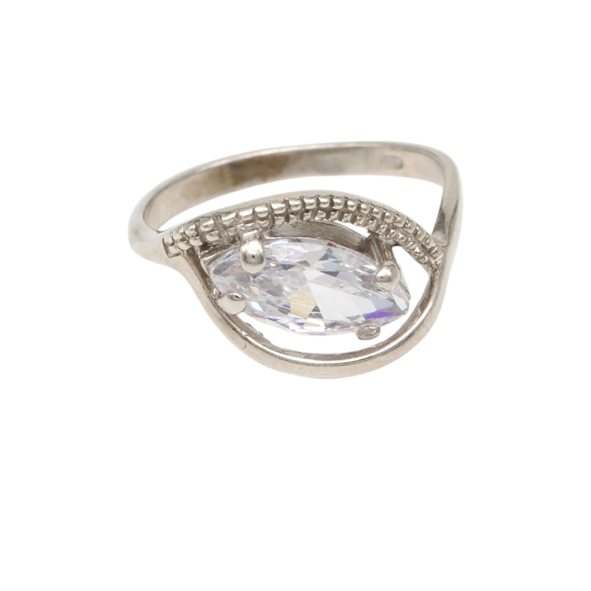 730af575f9deaa16a71ce63600b48298jpg - Mezola OÜ Silver ring with a marquise/facet-cut clear gemstone held by four prongs in a decorative, openwork setting.