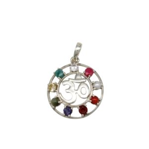 Silver circular pendant featuring the Om symbol at the center, ringed by small colored gemstones in green, yellow, purple, blue, red, and white.
