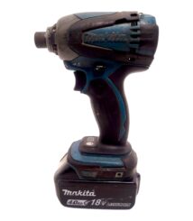 Cordless Makita drill with blue and black body, 18V Li‑ion battery attached, viewed from the side.