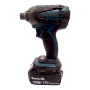Cordless Makita drill with blue and black body, 18V Li‑ion battery attached, viewed from the side.