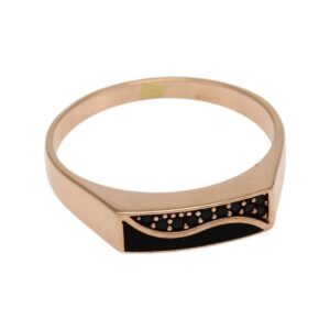 Rose gold ring with a flat top featuring a black enamel wave and small black stones along the edge