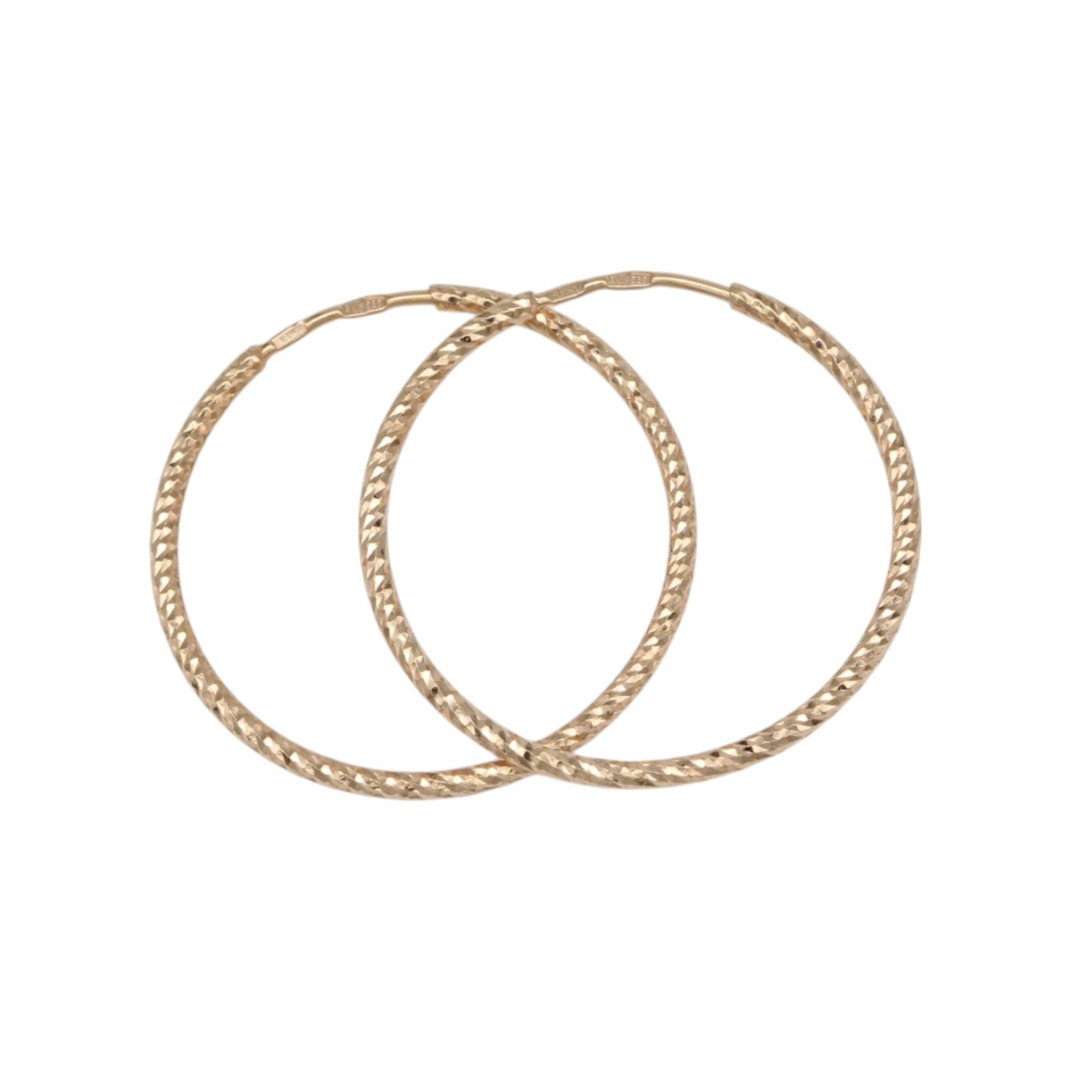 8fcd13618ab405650bd54be018815ab2jpg - Mezola OÜ Three gold textured hoop bangles overlapped on a white background
