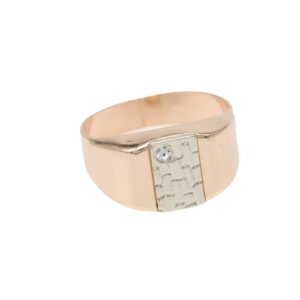 Two-tone ring: rose gold band with a textured silver rectangular inlay and a small diamond