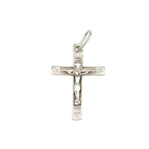 Silver crucifix pendant featuring a detailed Jesus figure, loop bail for necklace chain.