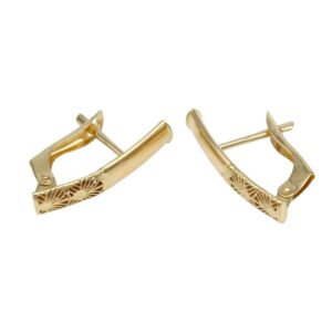 Gold-tone hinged hoop earrings with an engraved sunburst pattern on the front of each hoop