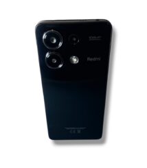 Tilted black smartphone on a white background with a visible front camera at the top edge.