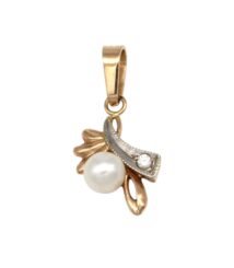 Gold pendant featuring a white pearl and a small diamond, set in a decorative floral motif with a curved, leaf-like design