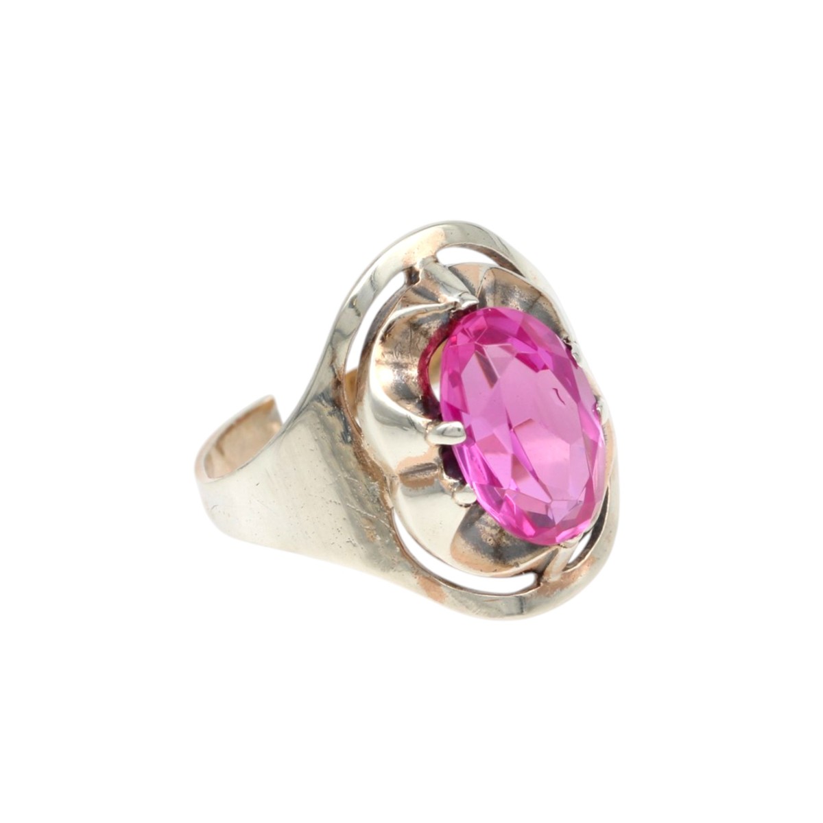 b7069ff28ef3b7bd6eb85967ef9dcbebjpg - Mezola OÜ Silver ring with an oval pink gemstone held by a decorative setting.
