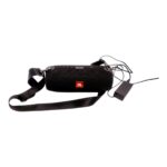 Black JBL portable Bluetooth speaker with an integrated strap and charging cable attached.