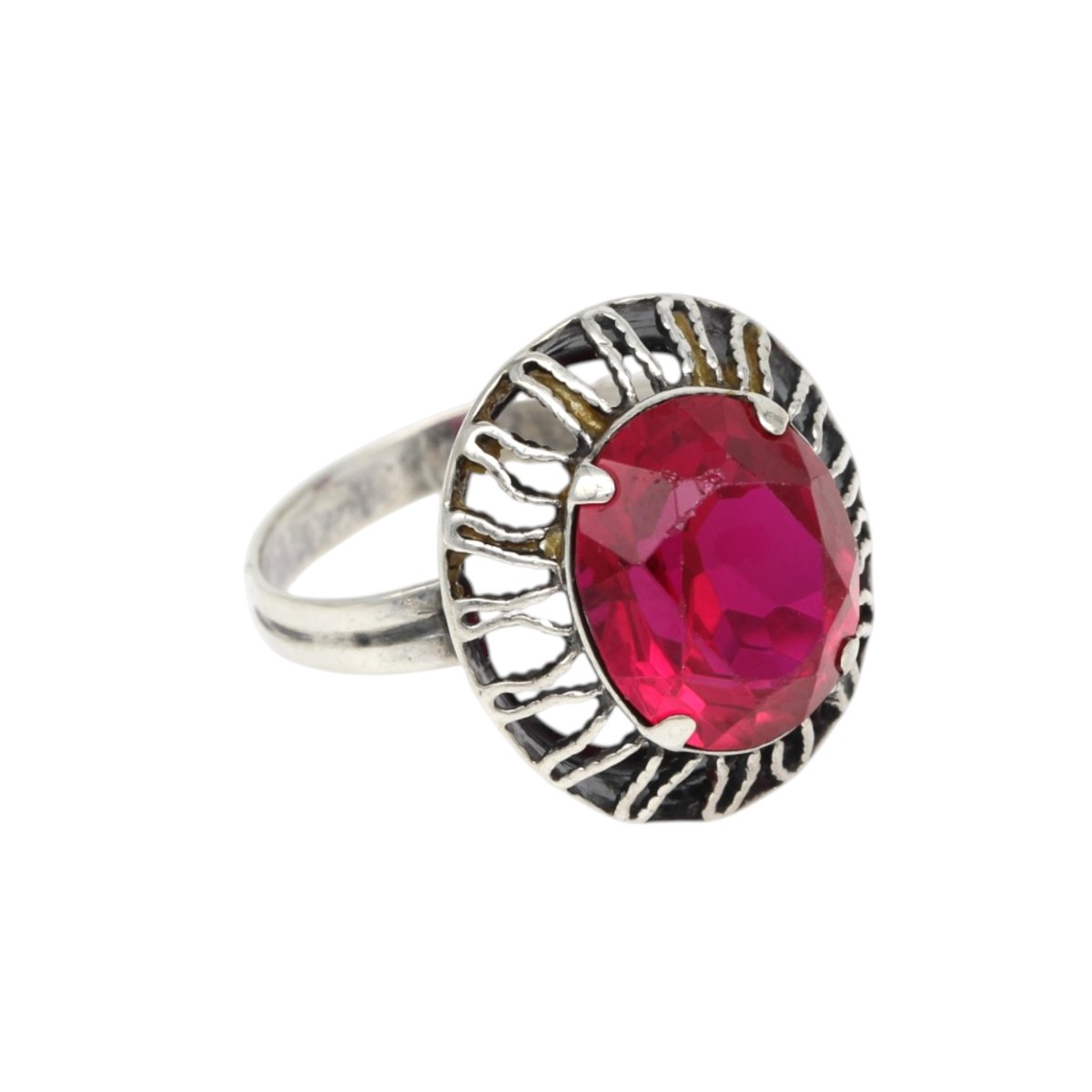 c44ba5a9686e37506cf6bc056399400bjpg - Mezola OÜ Silver ring with a large oval red gemstone set in a decorative bezel with a textured halo.