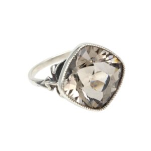 Silver ring with a large cushion-cut smoky quartz in a bezel milgrain setting