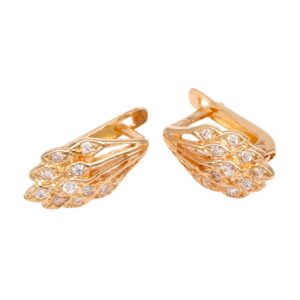 Gold-tone winged earrings embellished with clear crystals, viewing two pieces from a product photo