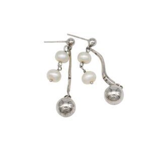 Silver-tone dangling earrings with small white pearls and a round silver ball charm at the end