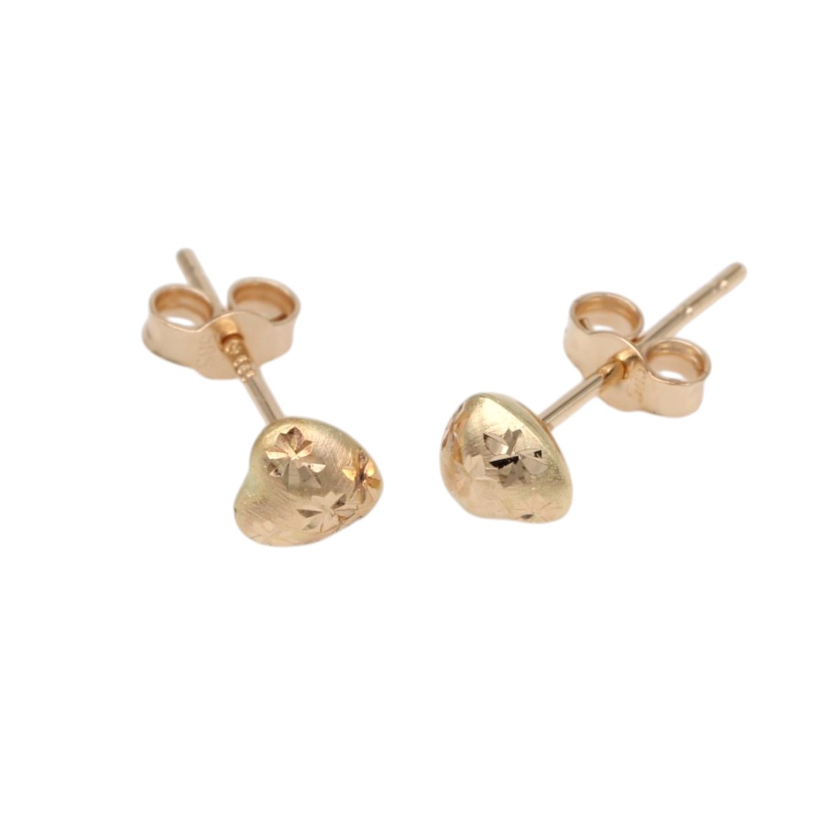 1584d3afcfbb13aa055000cba1ee6b2bjpg - Mezola OÜ Gold heart-shaped stud earrings with delicate floral engravings on the surface; pair shown against a white background.