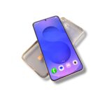 Smartphone with a purple wallpaper and a clear protective case, angled diagonally on a white background, showing home screen icons at the bottom edge.