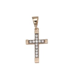 Gold cross pendant with diamond accents on a polished finish surface.