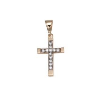 Gold cross pendant with diamond accents on a polished finish surface.
