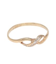Gold-toned ring with a twisted infinity-shaped centerpiece set with small diamonds