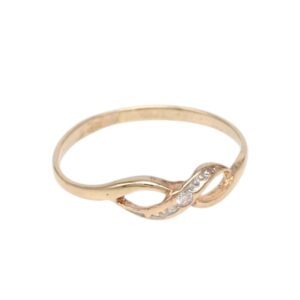 Gold-toned ring with a twisted infinity-shaped centerpiece set with small diamonds