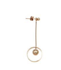 Gold-tone drop earring with a long slender stem and a circular hoop at the bottom, containing a small gold ball inside the hoop