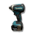 Cordless Makita drill with teal and black body and 18V battery attached