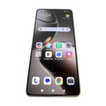 Smartphone tilted to show home screen with Google search bar and app icons (Gallery, App Mall, Mi Home, Google Play) on a dark wallpaper background.