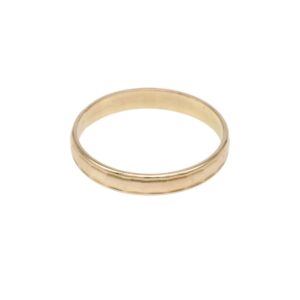 Gold wedding band with a smooth, slightly beveled edge.