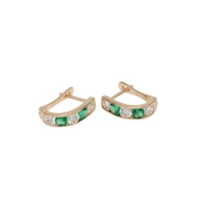 Gold curved hoop earrings set with alternating green and clear stones for a jeweled look.