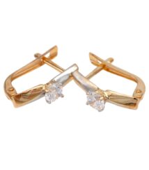 Two-tone gold cufflinks with a round-cut clear gemstone, facing outward on a white background