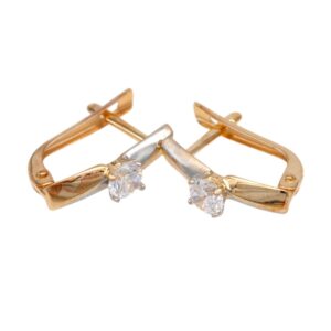 Two-tone gold cufflinks with a round-cut clear gemstone, facing outward on a white background