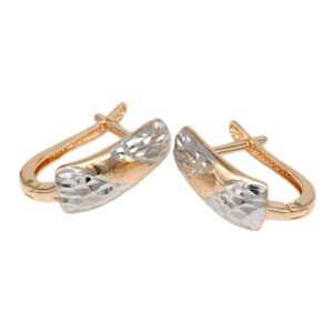 Rose-gold hoop earrings with faceted silver-toned front crescents facing each other, jewelry style.