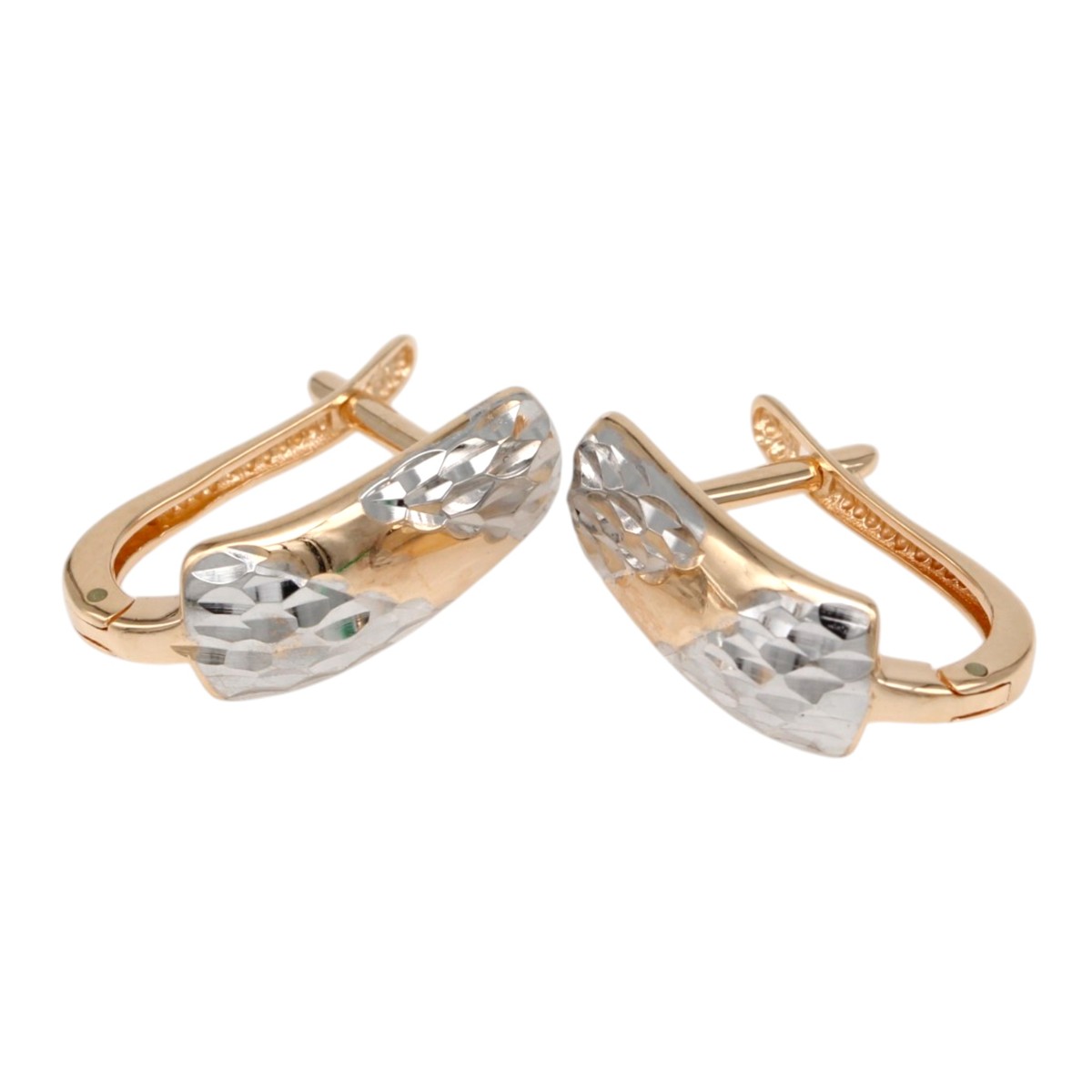 7edea2def6a99b2b59f12c96d55a8ceejpg - Mezola OÜ Rose-gold hoop earrings with faceted silver-toned front crescents facing each other, jewelry style.