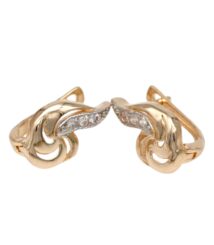 Pair of gold knot earrings with pavé diamonds along the inner curve