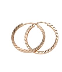Rose-gold hoop earrings with a diagonal faceted pattern on a white background - two hoops overlapping