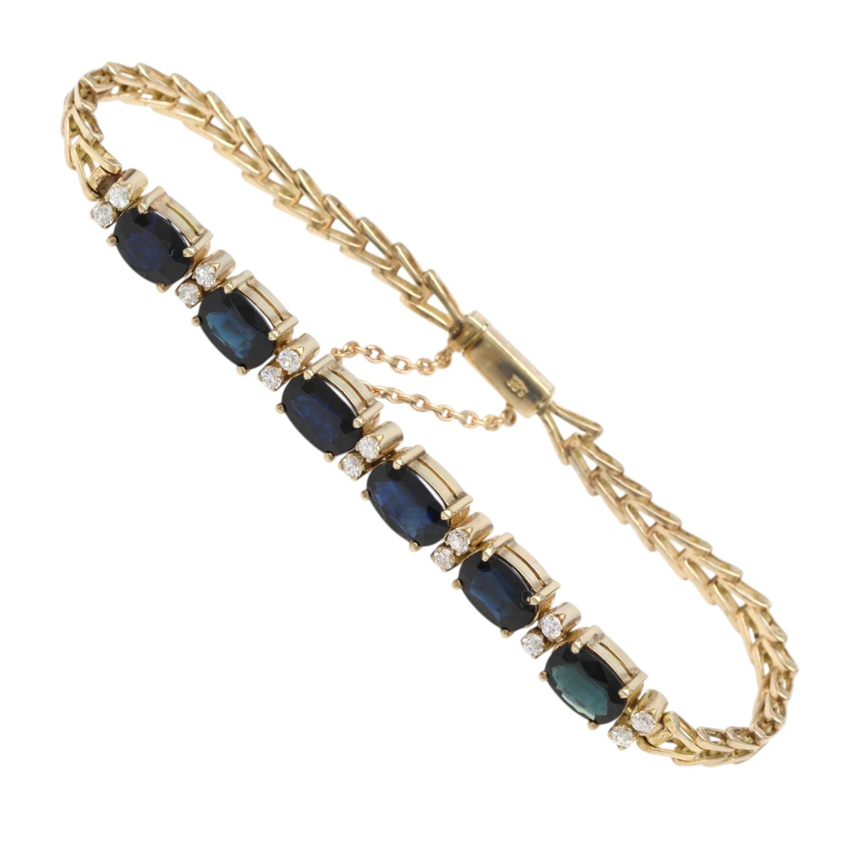 c8bf94fd59808646f154911607115de2jpg - Mezola OÜ Gold bracelet featuring oval blue gemstones set along a linked band with diamond accents on each setting