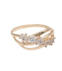 Gold ring with a curved band and a cluster of small diamonds along one side.