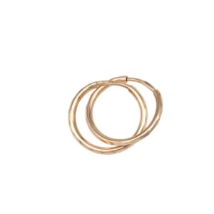Two thin gold hoop earrings intertwined on a white background, showing a simple circular design in rose/gold tone.